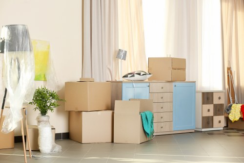 Man and van moving boxes and furniture in New Malden