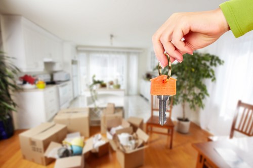 Moving house in New Malden with removal team and boxes