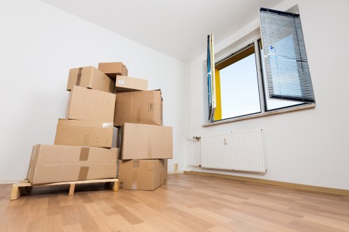 Loading furniture into a removal van for a New Malden move