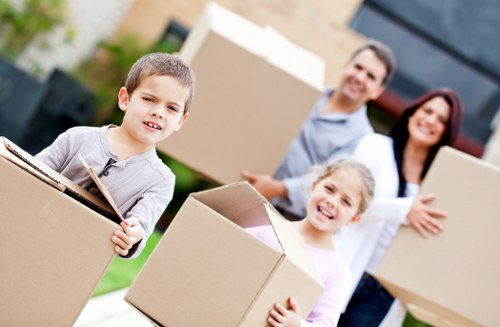Furniture and packed boxes ready for a New Malden home move
