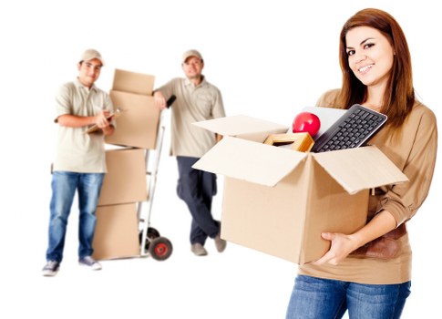 Office furniture and equipment being moved for a New Malden company