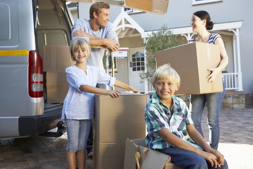 Local van service handling household items in New Malden