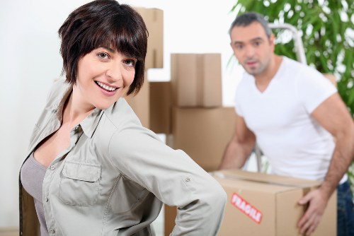 Office relocation equipment and boxed documents in New Malden